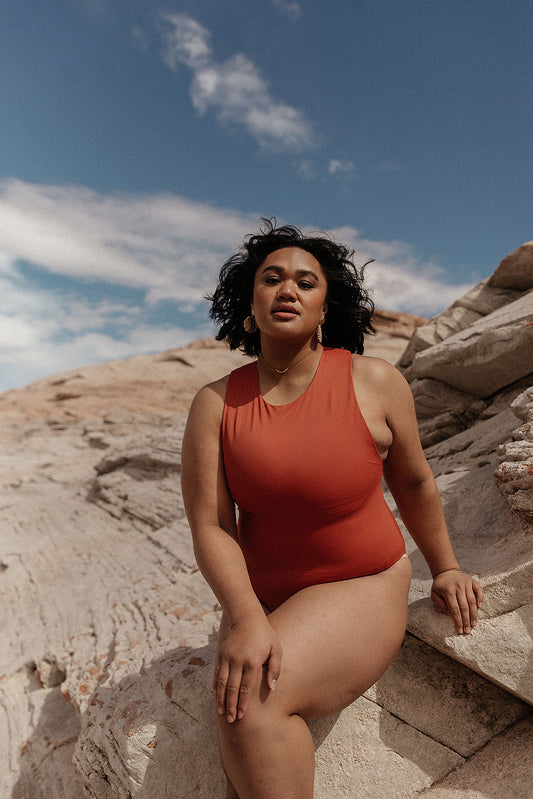 curvy woman in red Body Suit One piece swimsuit with a perfect high neck body sculpting suit